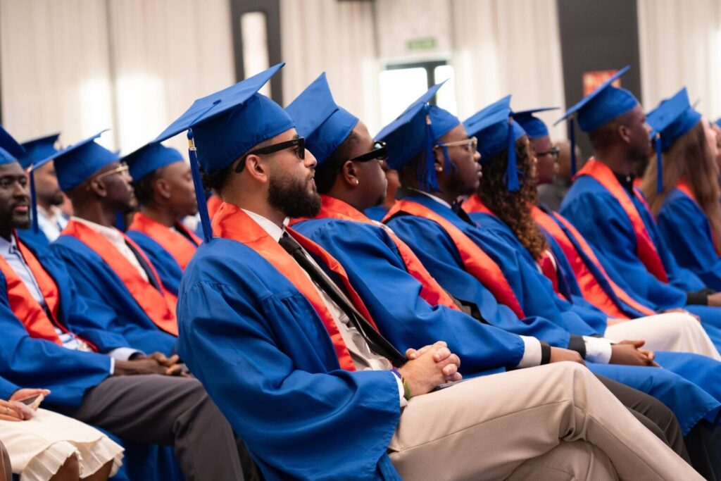 Graduates gathered for a Schellhammer Business School graduation ceremony.